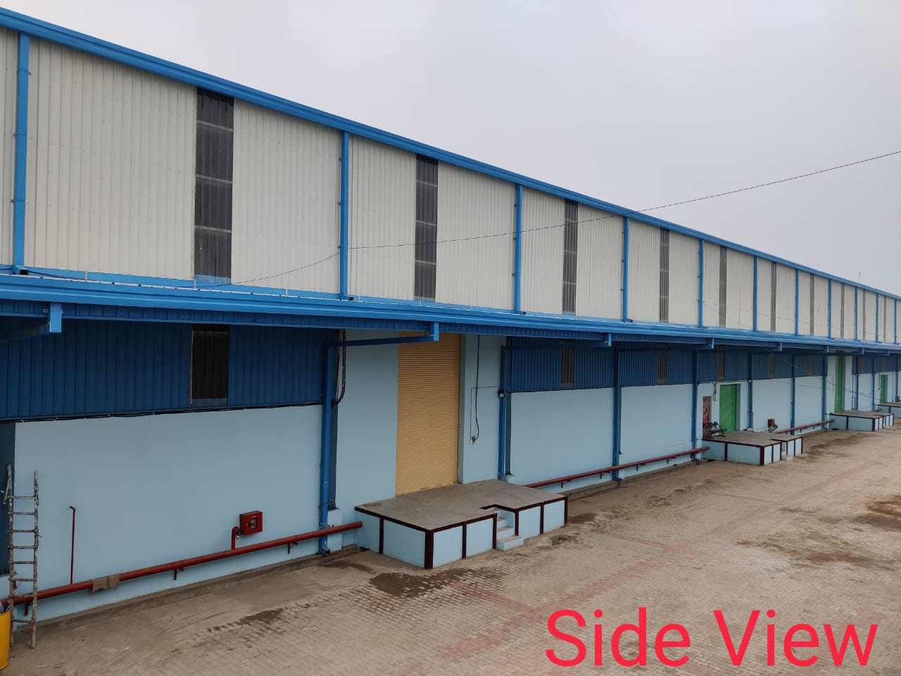 Side View & Loading Dock Bays of DHDL Warehouse